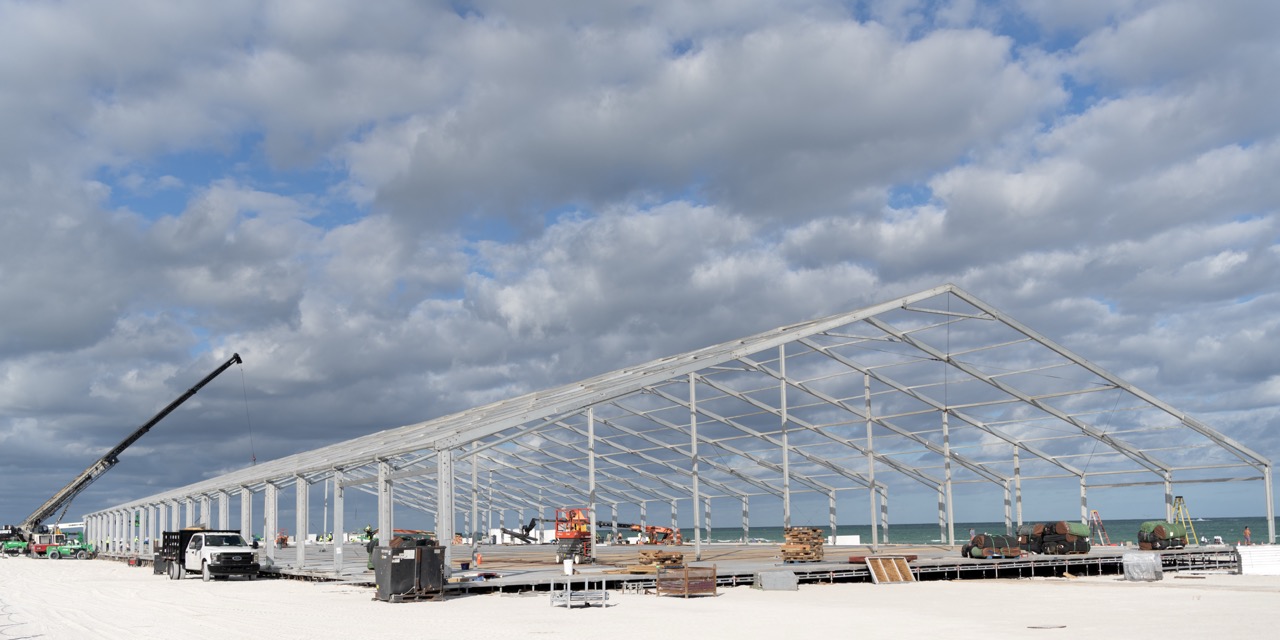 Miami, Florida, USA - November 16, 2024: Framework construction. Installation of metal structure with crane. Metal construction. Structural design engineering. Structure engineering at building site.